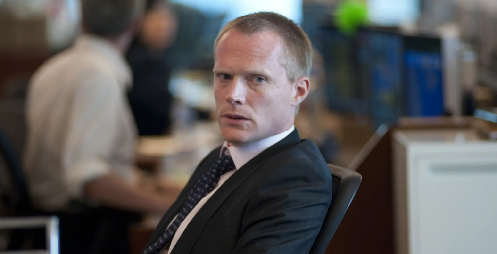 Actor Paul Bettany is a Wall Street banker witnessing a mass layoff.