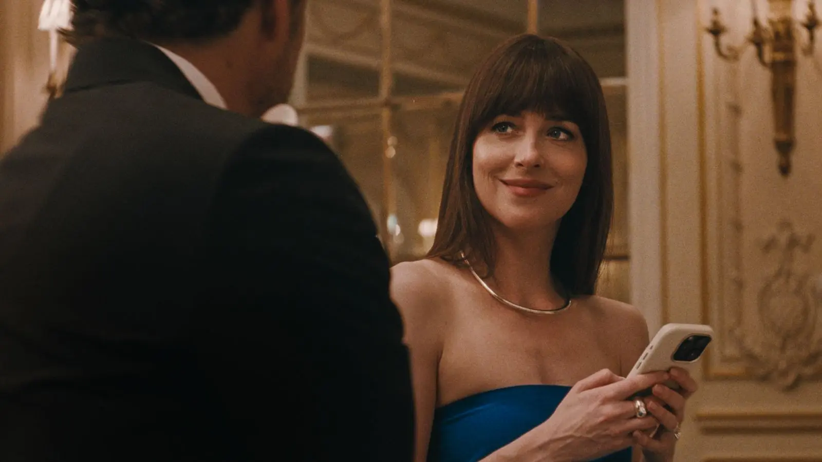 Dakota Johnson, Pedro Pascal, and Chris Evans play characters in a love triangle.