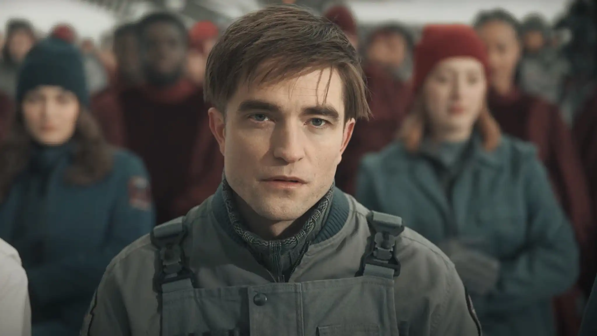 Robert Pattinson plays Mickey, someone whose job is to die and be reborn.