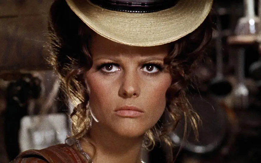 Actress Claudia Cardinale looks beyond the camera in disappointment.