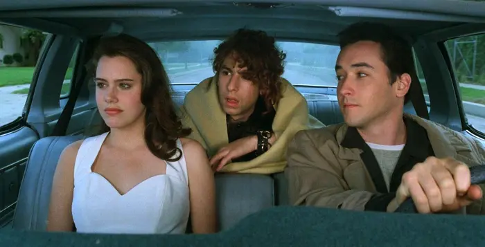John Cusack is a aimless high school graduate who falls for a high achiever.
